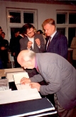 Janusz Tryzno and Zbigniew Brzezinski in the Museum of Artists (with Emmett Williams in the foreground), 1993